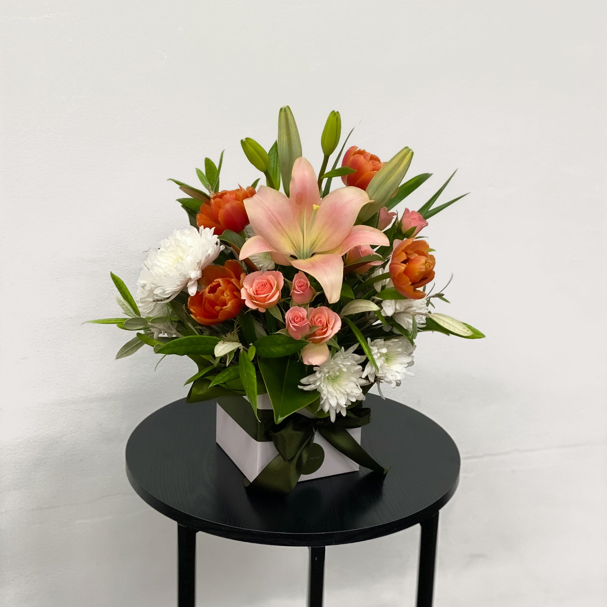 Fresh modern flowers arranged in a box. Same day Delivery in New Plymouth
